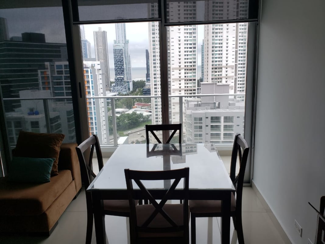 Open plan living dining with city views balcony access PH Top Towers Costa del Este Panama