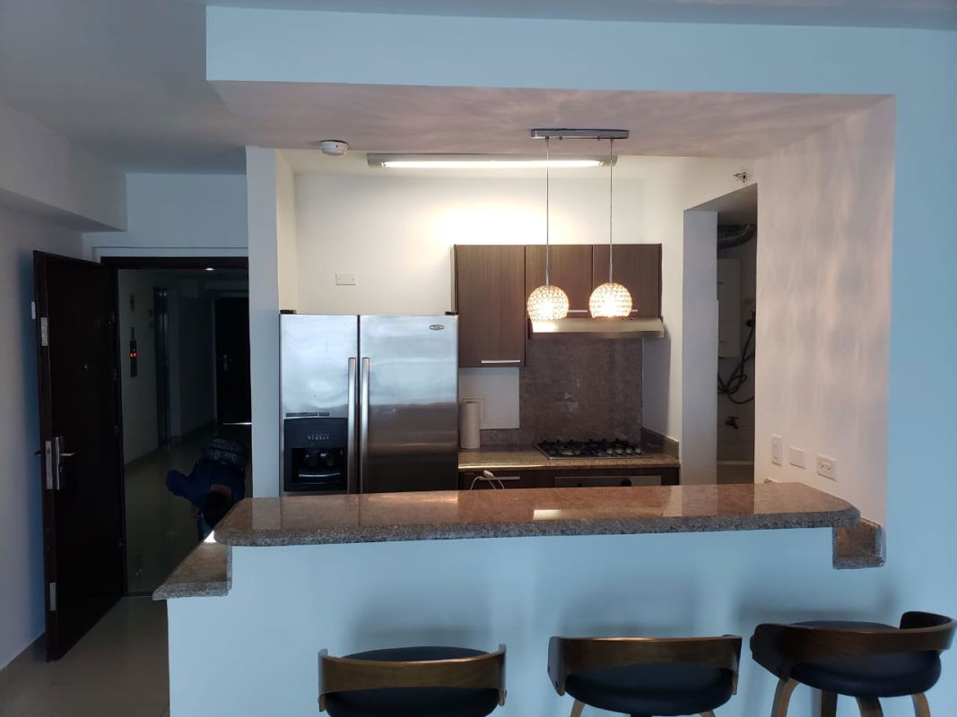 Modern kitchen with granite countertop stainless appliances PH Top Towers Costa del Este Panama