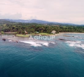 View of tropical greenery coastline and Caribbean waves Bahía Villareal Palenque Panama