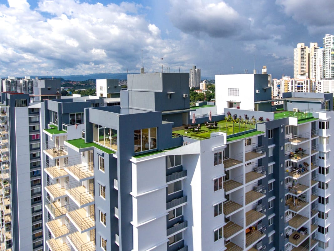 Aerial view Cosmopolitan Towers rooftop gardens and city skyline
