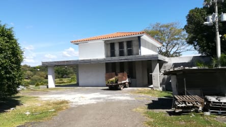 Tennis courts surrounded by greenery at Punta Barco resort beach community Panama