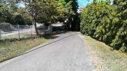 Two-story Mediterranean villa with red clay roof tiles at Punta Barco Resort Panama