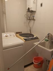 Laundry room with washer, dryer, utility sink and organizer Puntarena Buenaventura Panama