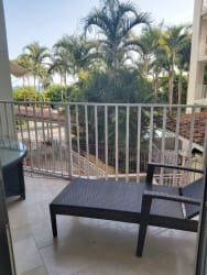 Private balcony with lounge chair and tropical views at Puntarena Buenaventura Panama rental