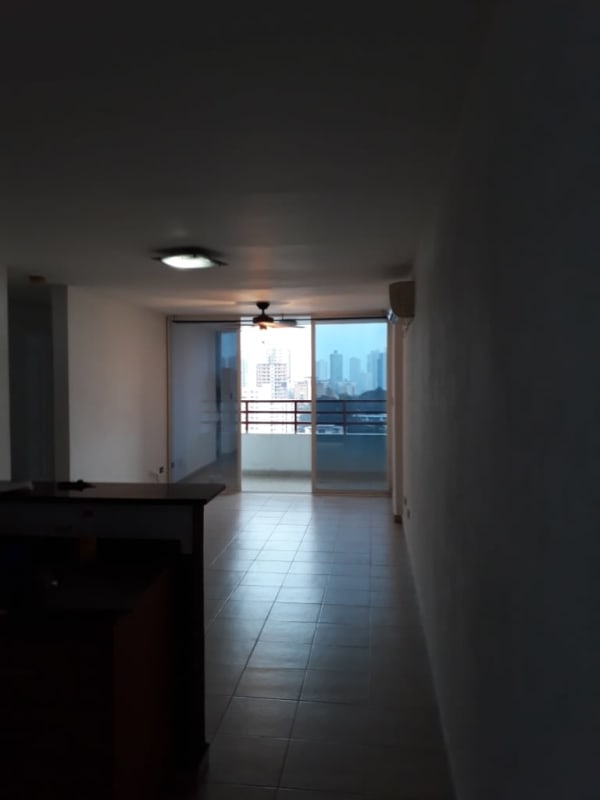 Bright living room with tile floors, sliding balcony doors in PH El Marquez Via España