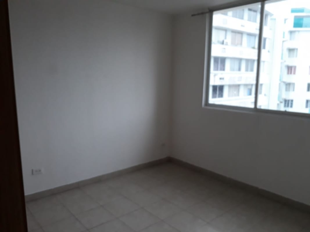 Bedroom with large window and air conditioning overlooking Panama city PH El Marquez