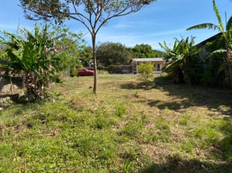 Aerial map showing residential and commercial area of central Las Tablas Panama with marked property boundary