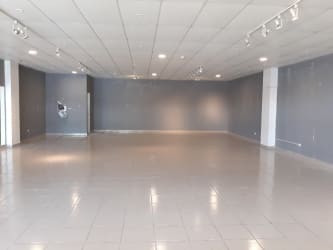 Commercial retail unit interior with tiled floor and neutral color walls in Nueva Gorgona Panama