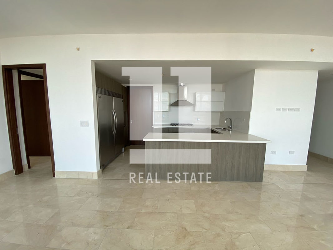 New kitchen with white quartz counters and stainless appliances PH Panorama Tower Panama