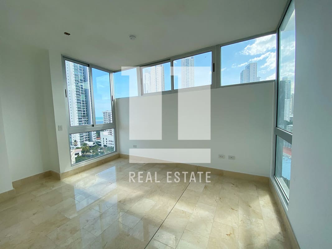 Luxury living dining room floor to ceiling windows ocean view PH Panorama Tower Coco del Mar Panama