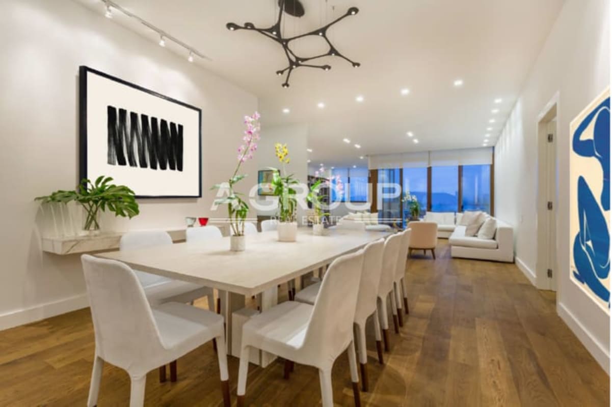 Modern dining room with city and marina views in garden apartment Ocean Reef Panama