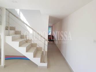 Large bedroom with balcony and window in beachfront townhouse Punta Chame Panama