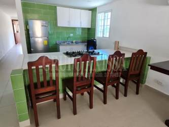 Laundry room with utility sink and window Punta Chame Panama townhouse