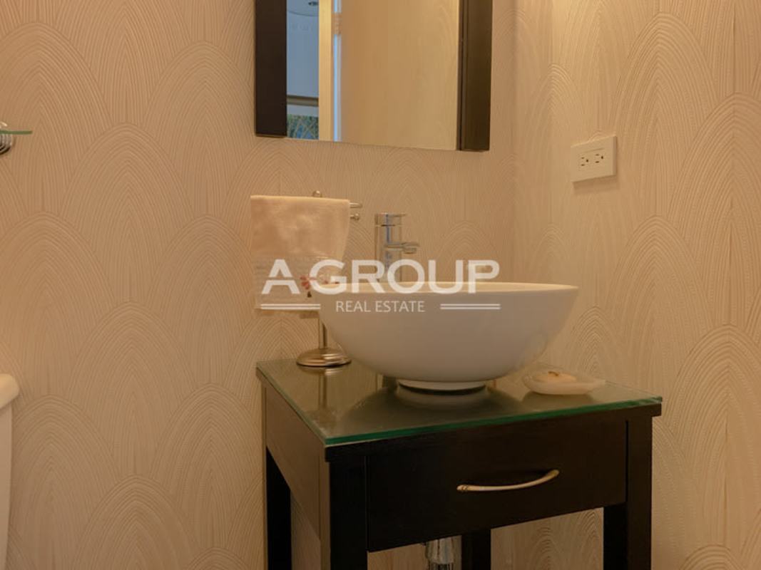 Bedroom featuring AC and large window PH Majestic apartment Panama