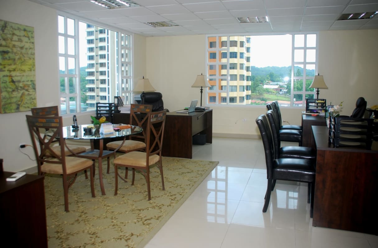 Modern executive office space with panoramic windows and city views in Camino de Cruces Business Center El Dorado Panama