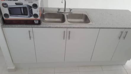 Kitchen with granite countertop and stainless steel sink Cerro Silvestre Arraiján Panama new house
