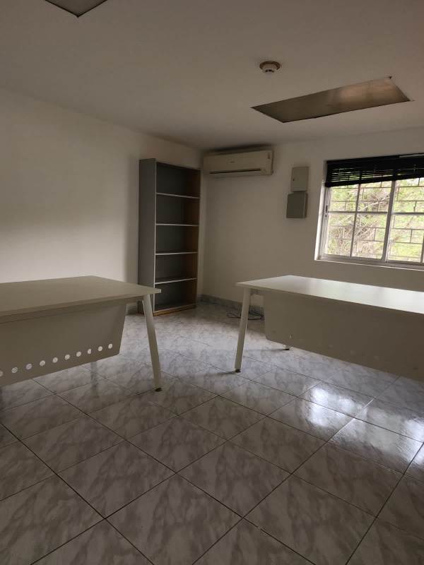 Air-conditioned minimalist office with large window and tiled floor in Urbanización La Boca Ancón Panama
