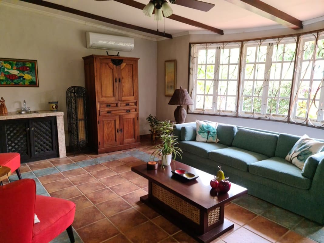 Outdoor swimming pool with fountain, pergola and tropical garden estate near beaches Panama