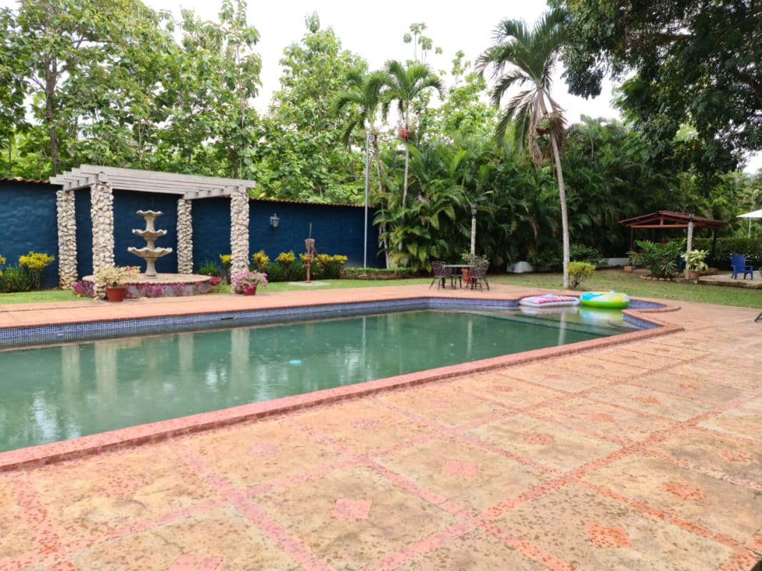 Traditional country dining and living with colorful decor exposed beams Coclé Panama