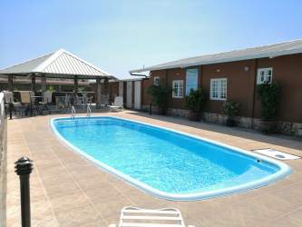 Bright bedroom tile floors garden view window Rincón del Paraíso Río Hato Panama rent