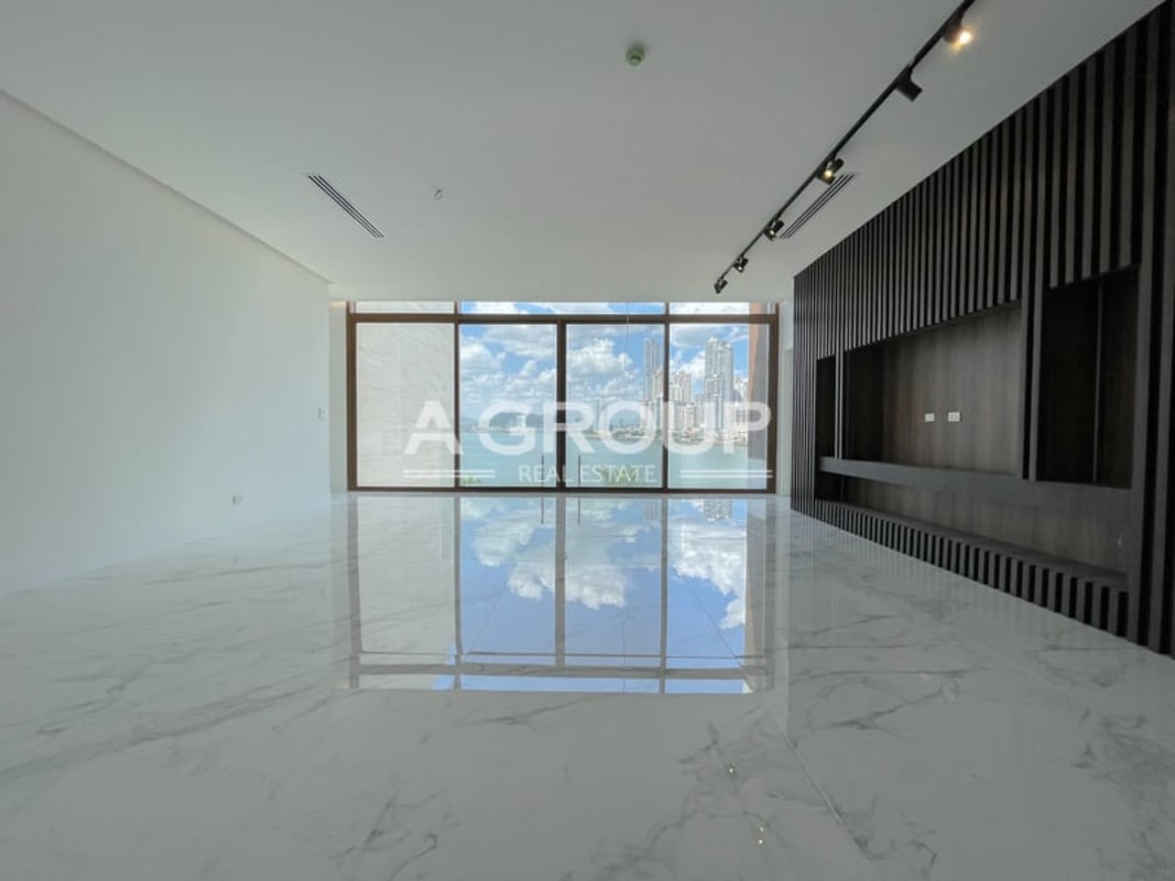 Modern luxury penthouse kitchen with marble island and premium finishes Ocean Reef Islands Panama