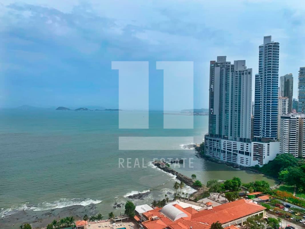 Contemporary kitchen with wood cabinets, granite countertops, appliances PH Ocean Park Panama