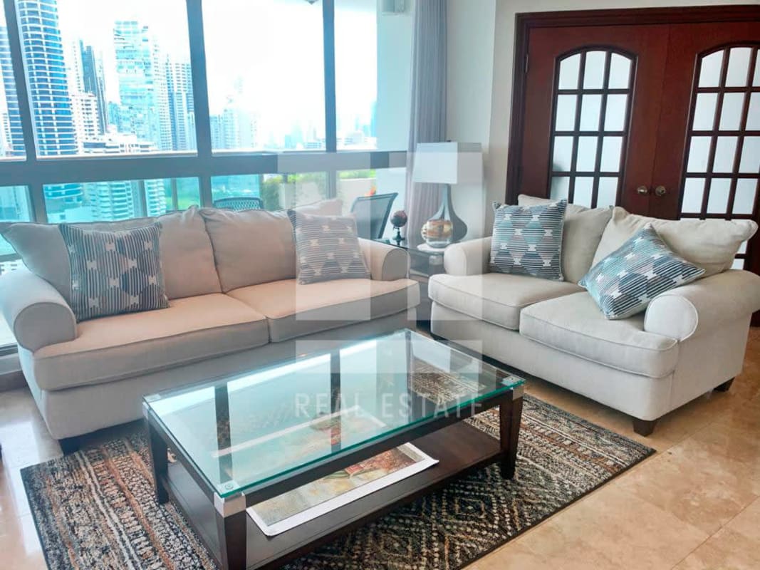 Tropical style swimming pool area children’s playground palm trees PH Ocean Park Panama