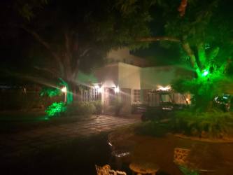 Large dining space open to kitchen and living area at Coronado beach residence Panama