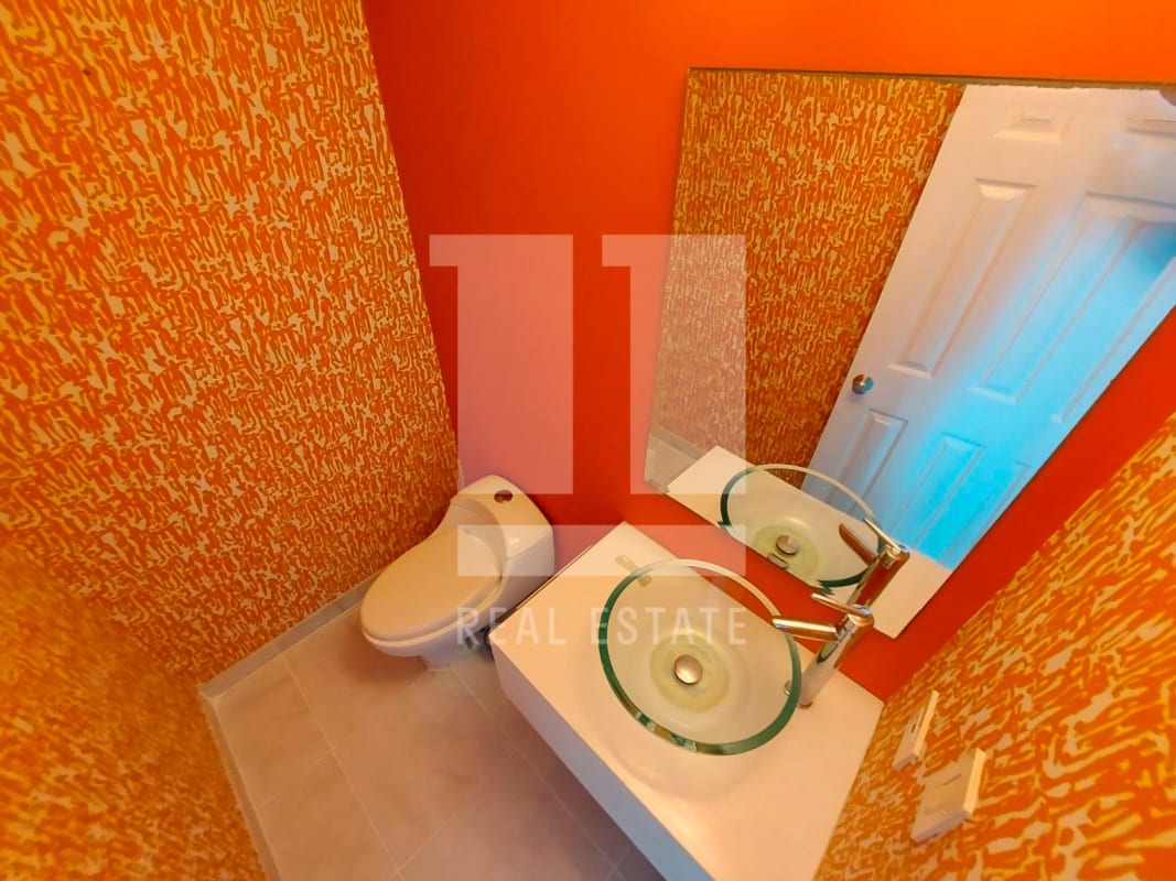 Open space for den and dining room with access to balcony at PH Brisas de Marbella Panama City