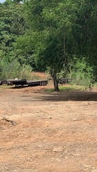 Undeveloped 1 hectare land parcel for sale with highway frontage in Arraiján Panama ideal for commercial residential development