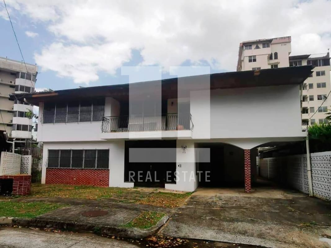 Empty bedroom with mint green wall, tile floors, built-in closet Casa Dudley Obarrio Panama