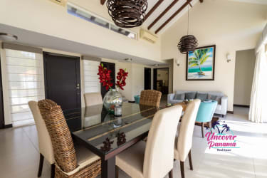 Spacious open-plan living dining area with vaulted ceilings natural light in Costa Blanca luxury villa for sale Panama