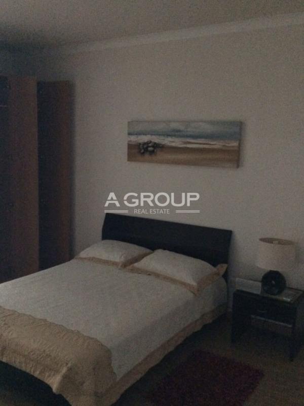 Modern bathroom with glass shower enclosure and vessel sink at PH Pacific Sky Punta Pacifica Panama