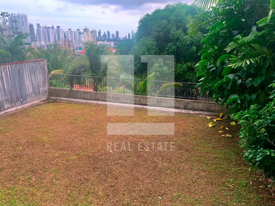 Fenced backyard garden with plunge pool in multi-level house Dos Mares Panama