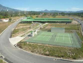 View of tennis courts and clubhouse with mountain scenery Boquete Panama