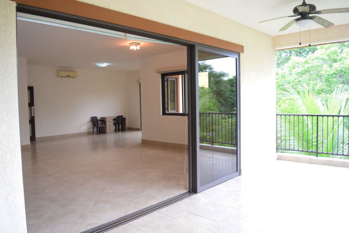 Large bright living room opening to balcony terrace Embassy Club Garden 3 Panama City
