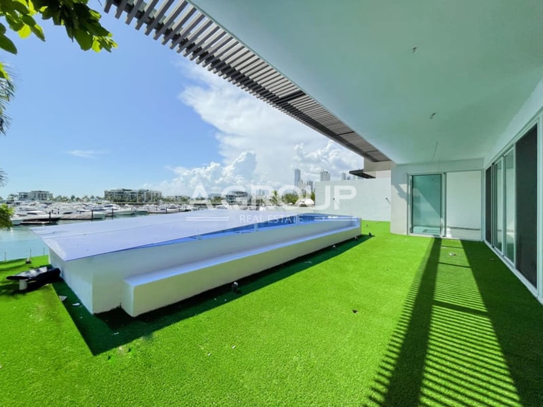 Contemporary waterfront villa facade at Ocean Reef Island II in Panama City luxury real estate