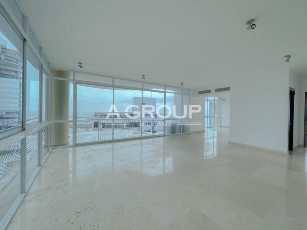 Penthouse master suite with floor-to-ceiling windows and views in Punta Paitilla PH Vista del Sol