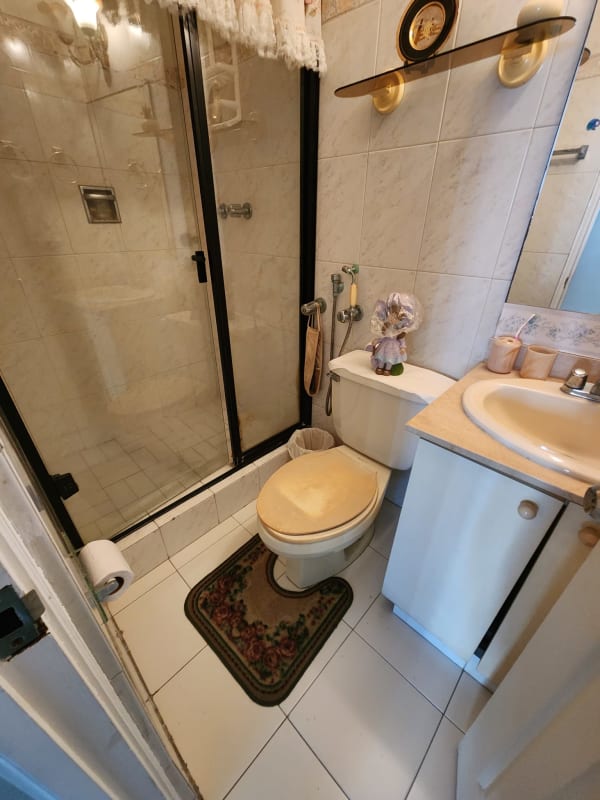 Classic kitchen with granite countertops, gas stove and ample cabinets at PH Terrazas del Cangrejo Panama