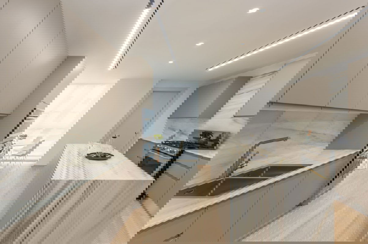 Elegant dining area with view of ocean floor-to-ceiling windows The Towers Paitilla Panama City