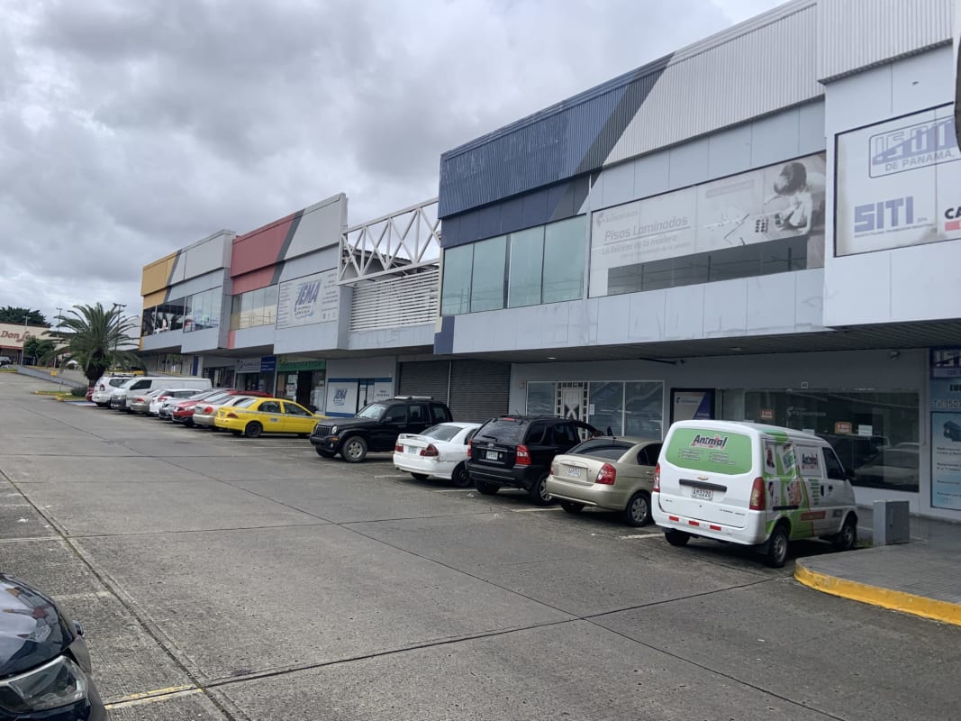 Commercial entrance of Plaza Conquistador with signage Villa Lucre Panama
