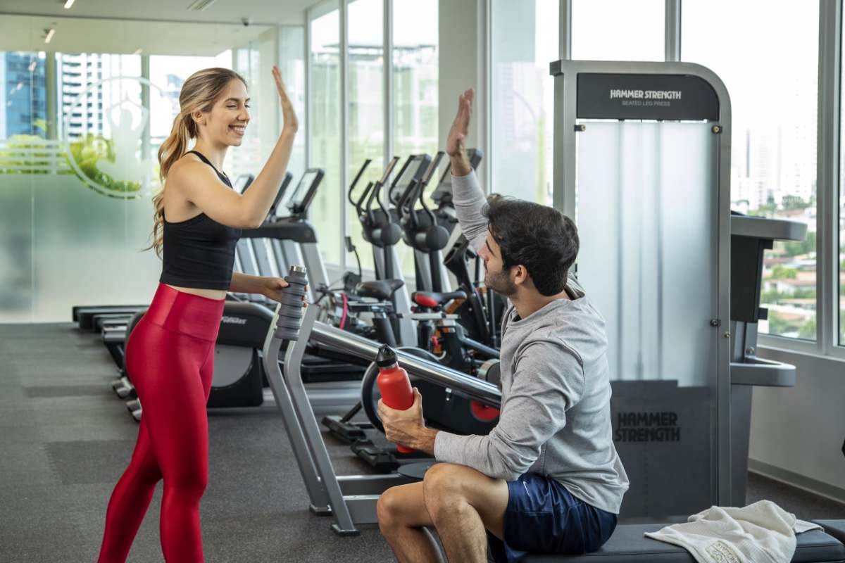 Fitness center with natural light, cardio and strength equipment at Riviera del Golf condos in Panama City