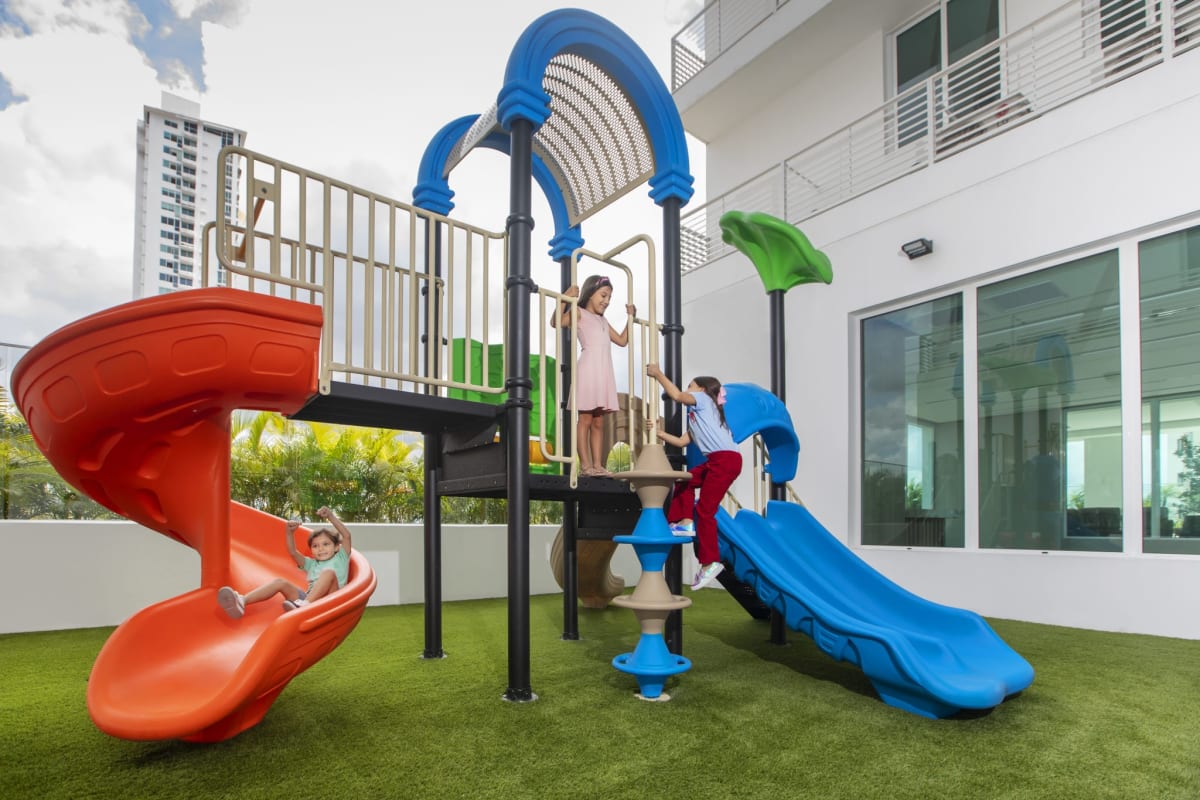 Outdoor playground with slides at Riviera del Golf new residential tower Panama