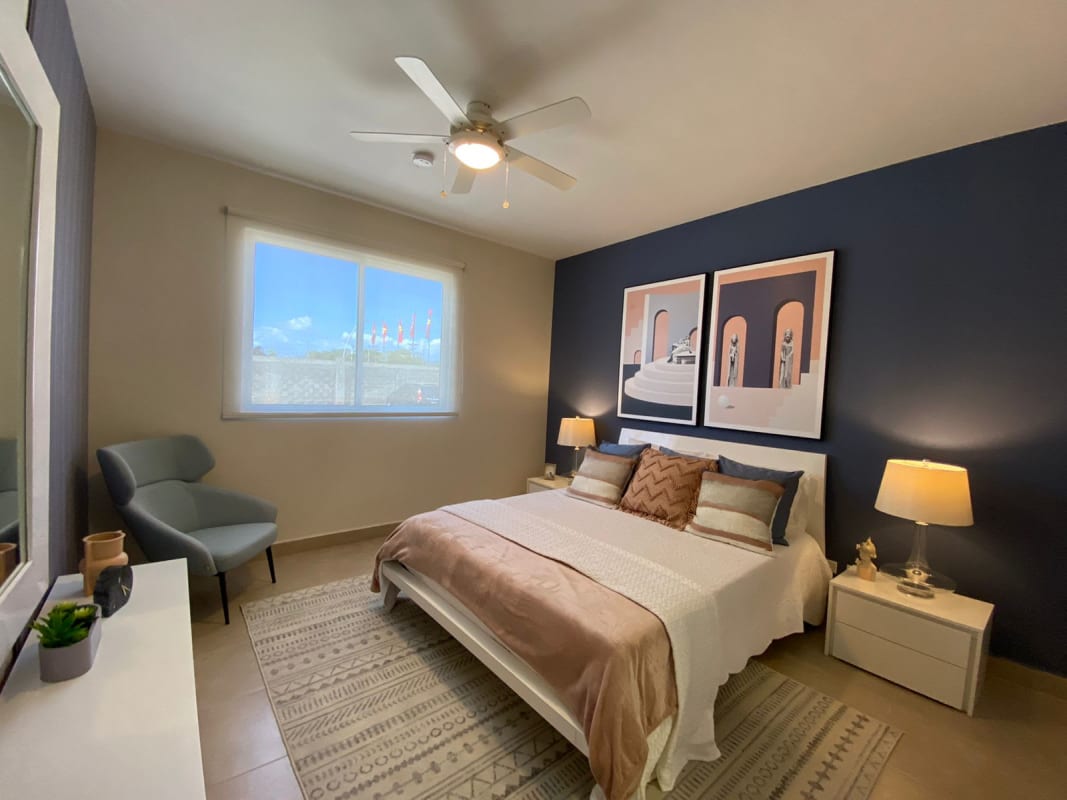 Modern open concept living and dining room with neutral decor in new apartment Torres de Cantabria Tocumen Panama