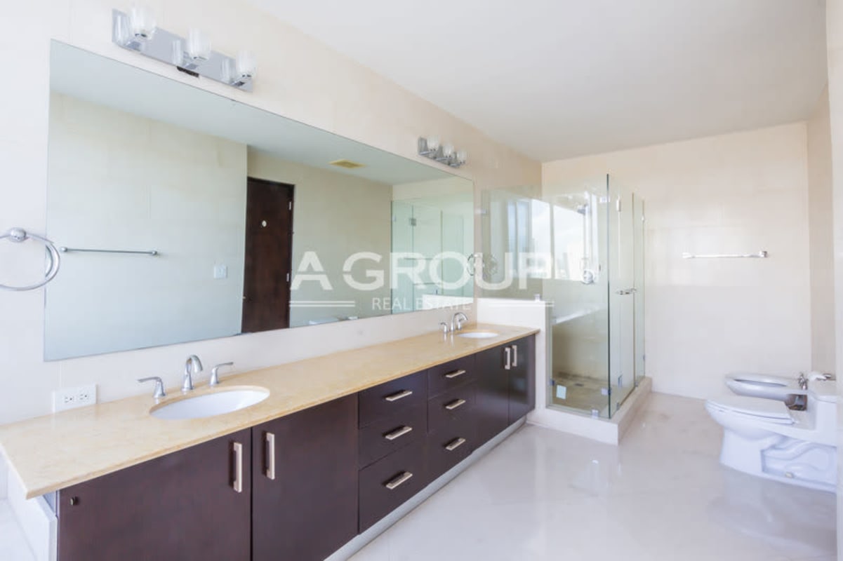 Elegant master suite with marble finishes and panoramic ocean views in The Point Tower Panama