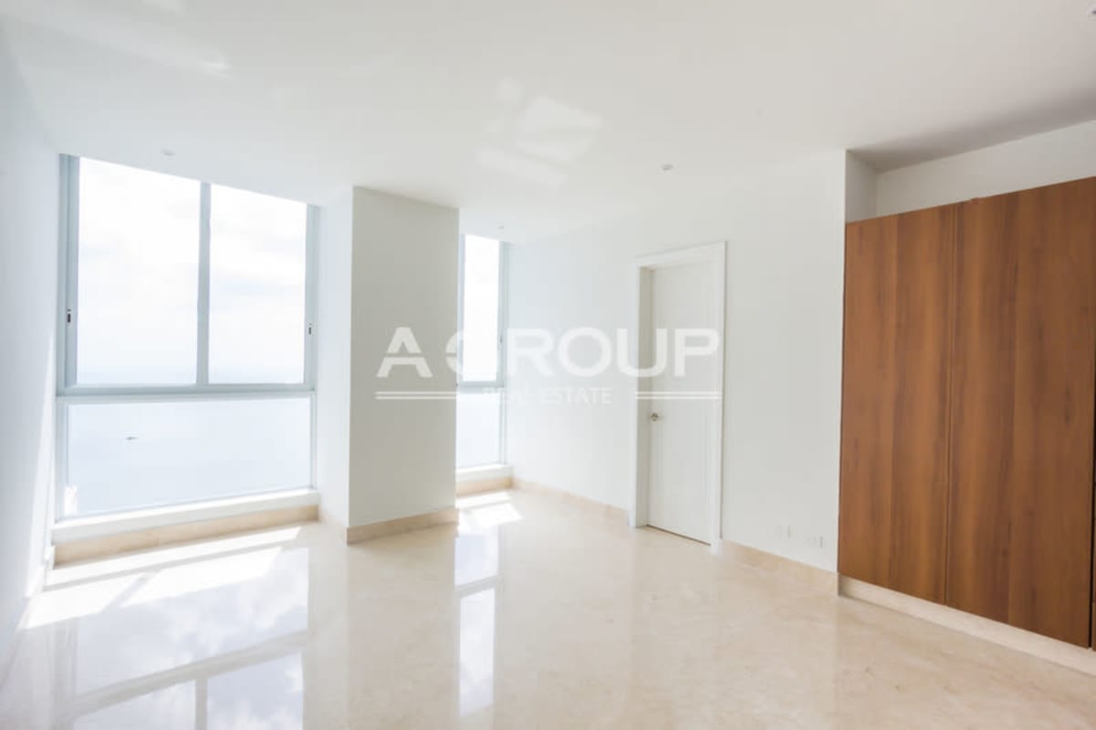 Modern luxury kitchen granite counters dark wood cabinets premium appliances The Point Panama