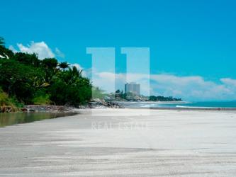 Expansive sandy beachfront views with ocean waves Punta Barco Panama