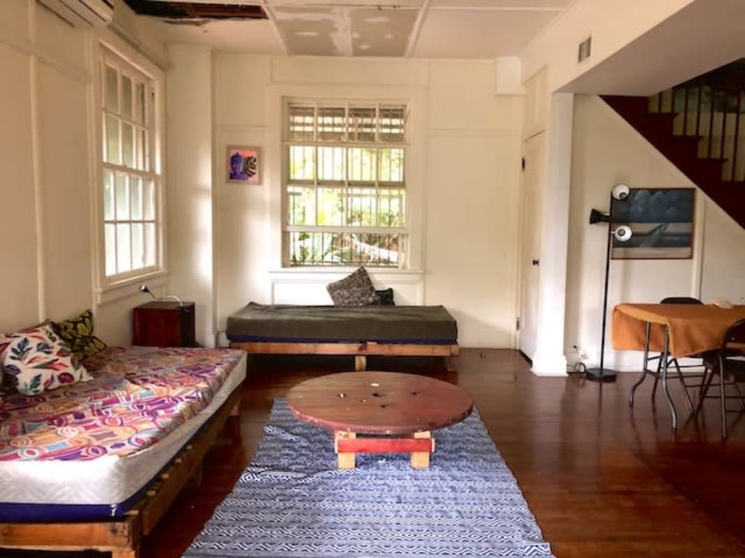 Lush tropical garden with palm trees and flowering plants Herrick Heights Ancon Panama