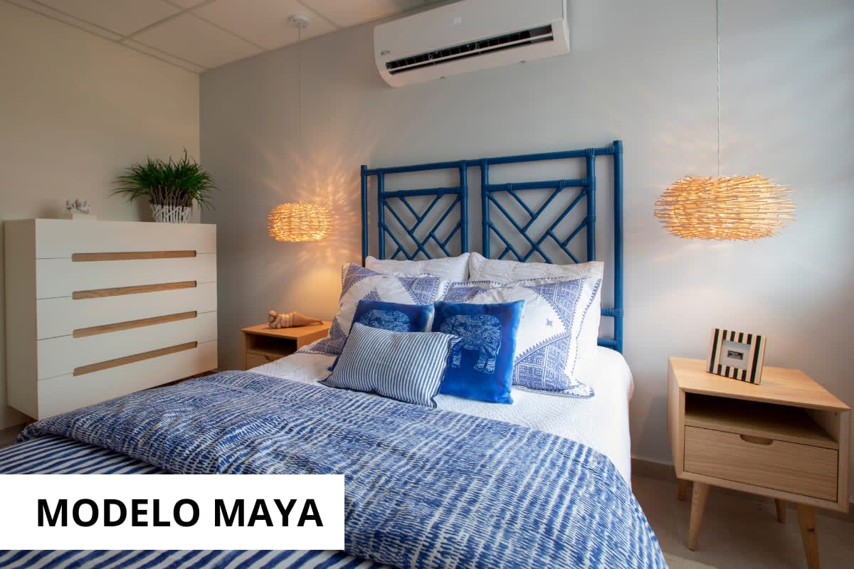 Open dining area with pendant light and kitchen sample Montemadero Panama