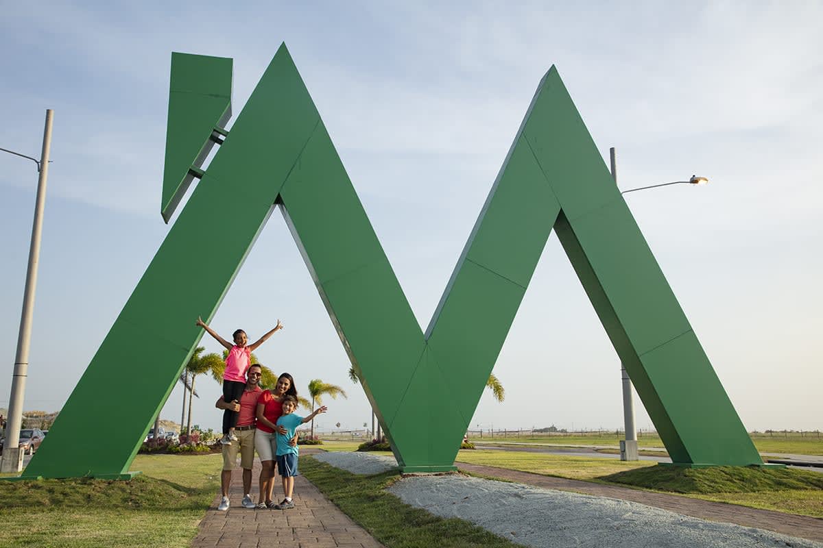 Green sculpture landmark Montemadero Panama entrance neighborhood identity